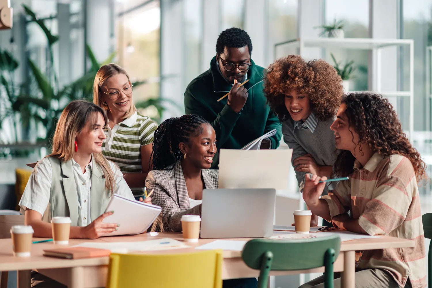 A team collaborating around a shared table
